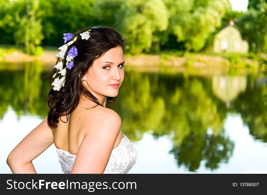 Portrait of young beautiful woman near lake. Portrait of young beautiful woman near lake