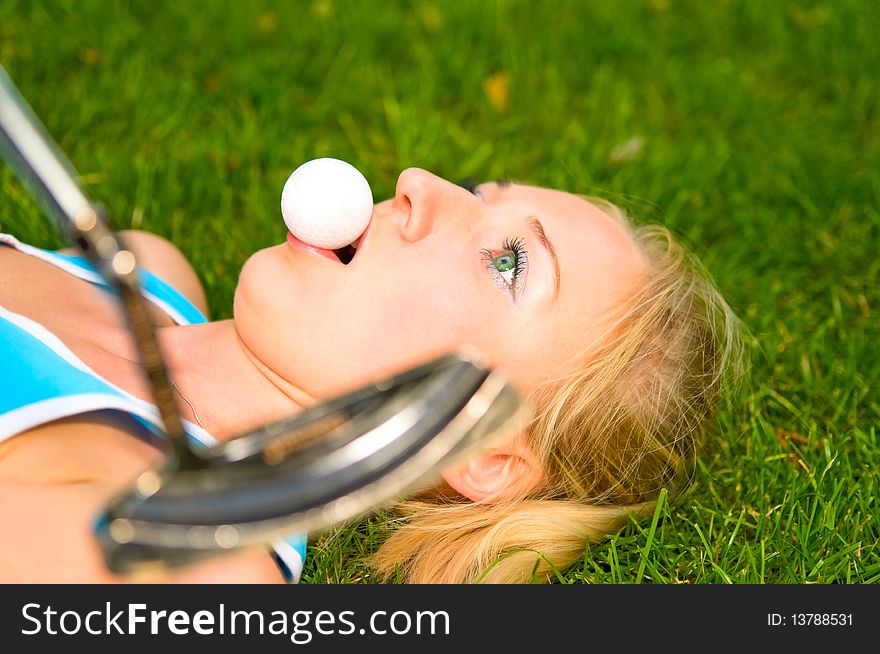 Young woman with ball on the grass. Young woman with ball on the grass