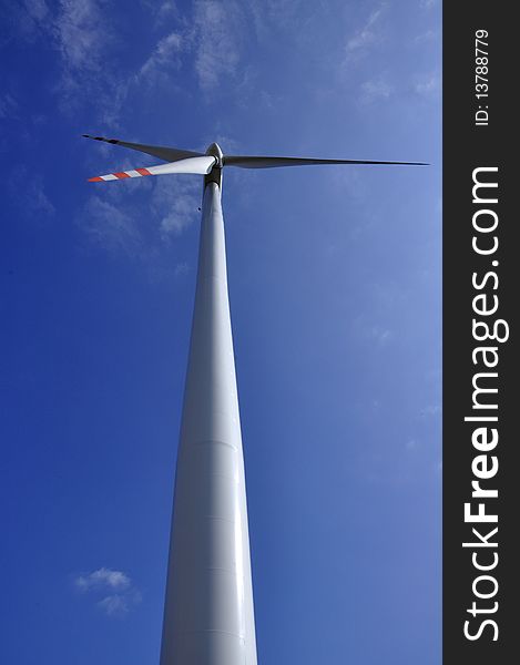 Wind turbine on sunny day