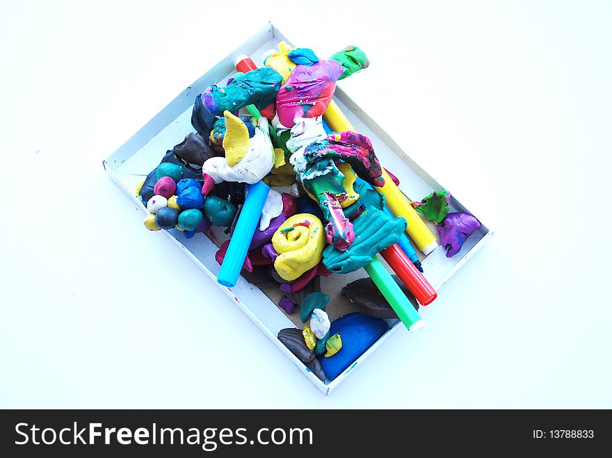 Figures stuck together from plasticine the small child. Figures stuck together from plasticine the small child