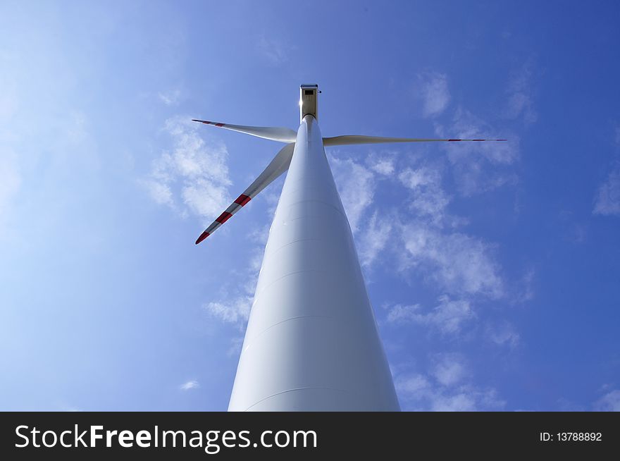 Wind turbine on sunny day