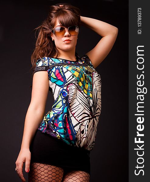 Image of girl wearing sunglasses and stylish clothes. Image of girl wearing sunglasses and stylish clothes