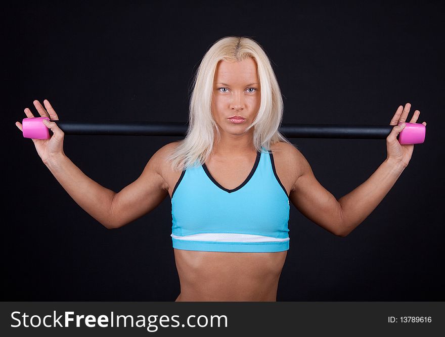 Woman Holding Fitness Bar