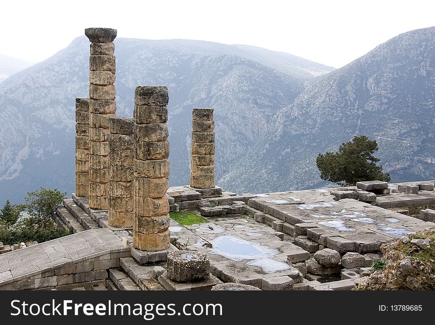 The ruins of Temple of Apollo in the archaeological site of Delphi in Greece; Delphi was believed to be the centre of the earth. The ruins of Temple of Apollo in the archaeological site of Delphi in Greece; Delphi was believed to be the centre of the earth