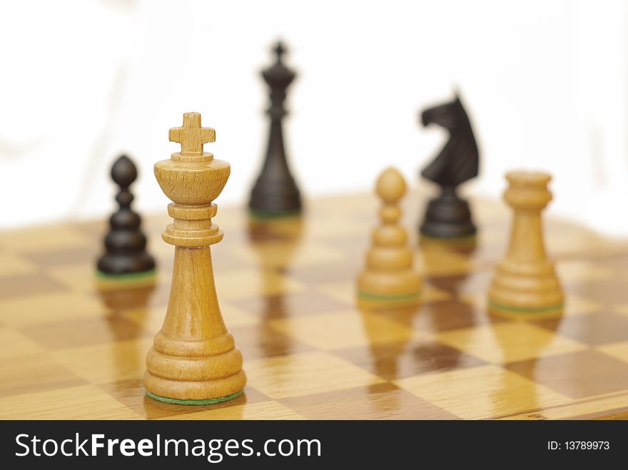 Chess figures while playing (white background). Chess figures while playing (white background)