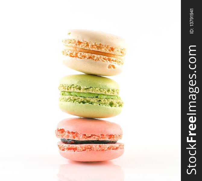 3 macaroons composition on a white background