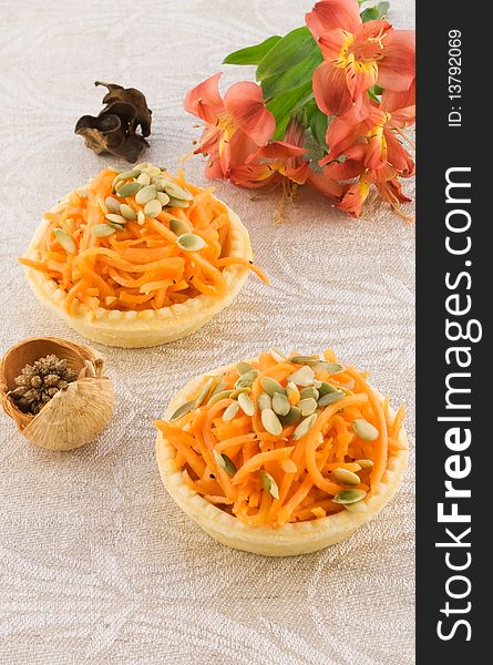 Carrot salad in a basket with flower