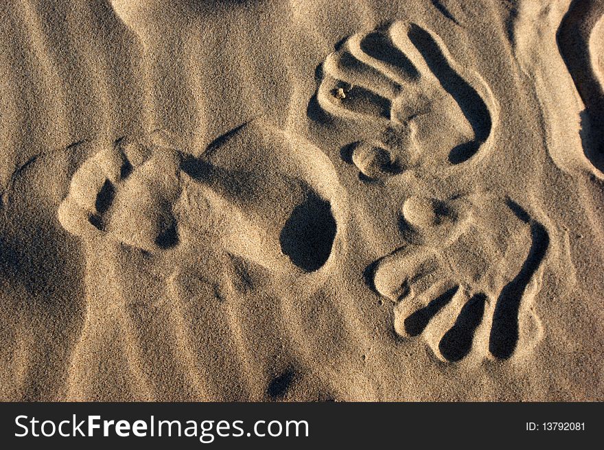 An image of footprint on sand