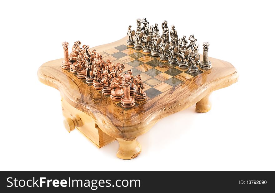 Metal Chess on olive wood chessboard. Metal Chess on olive wood chessboard