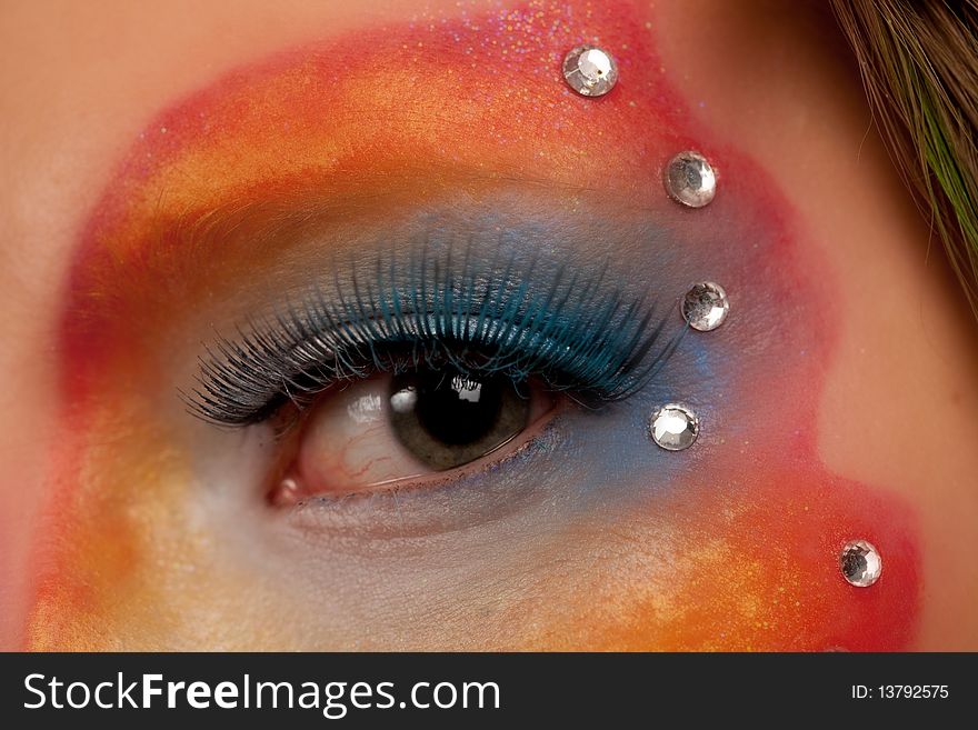 Girl eye close-up with colored make-up. Girl eye close-up with colored make-up