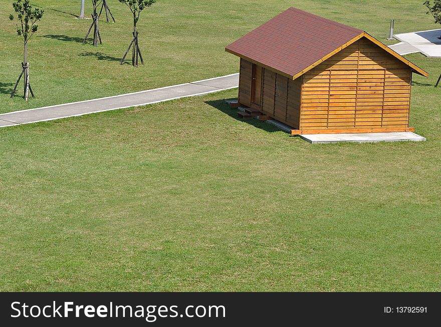 A woody house built beside the bicycle path. A woody house built beside the bicycle path