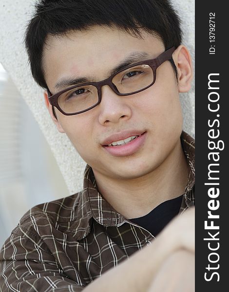 Portrait of a young Asian man