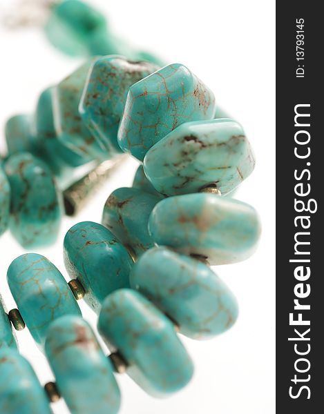 Beads with natural stone turquoise close-up. Beads with natural stone turquoise close-up