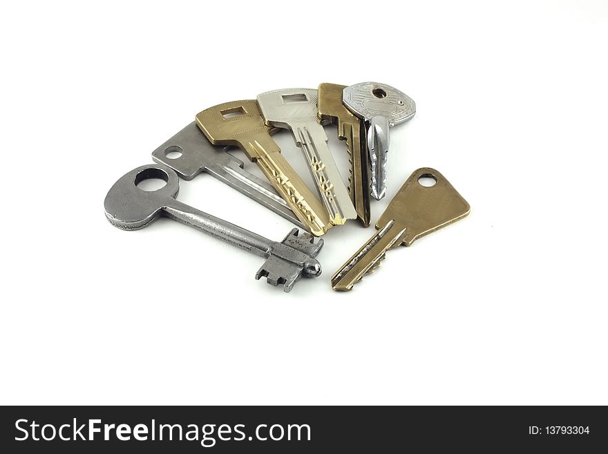 Collection of keys on the white background.