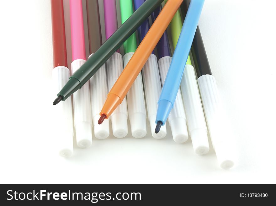 Set of color felt-tip pens on the white background.