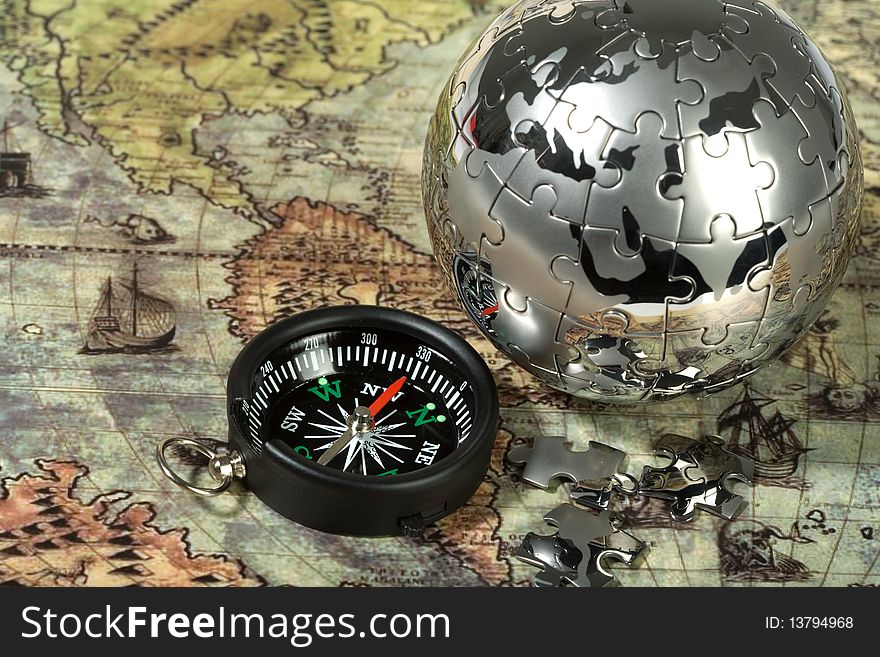 Compass on the old map. Concept travel.