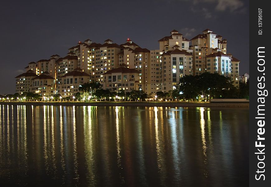 Colourful light reflections at Kallang Basin with apartments as background