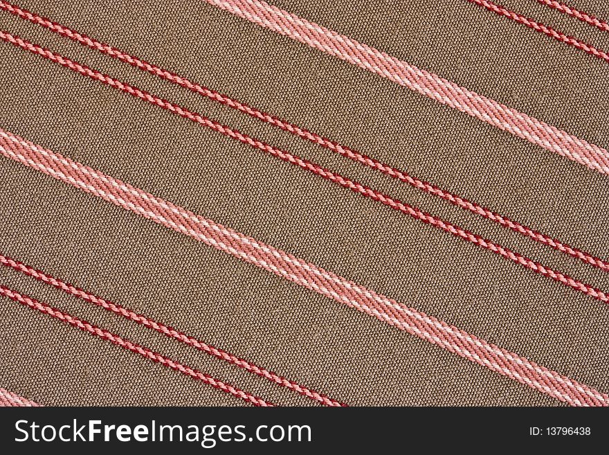 A closeup of a diagonal striped fabric background