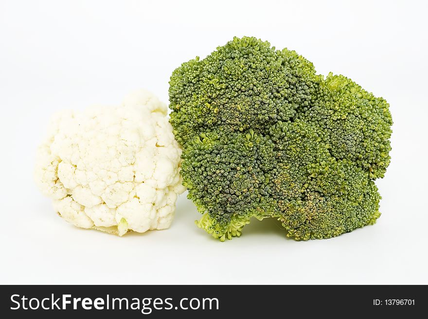 Cauliflower and Broccoli against white background