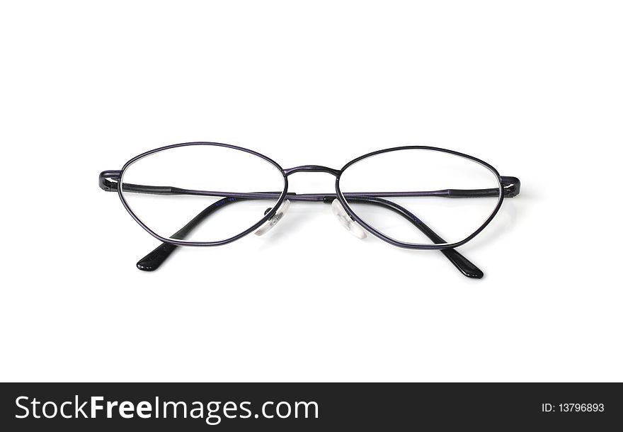 Eyeglasses closeup on a white background with reflection