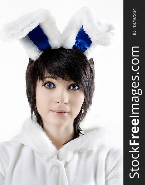 Portrait of young woman with blue eyes dressed as rabbit. Portrait of young woman with blue eyes dressed as rabbit
