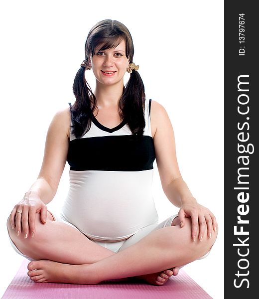A shot of a beautiful pregnant woman practicing yoga
