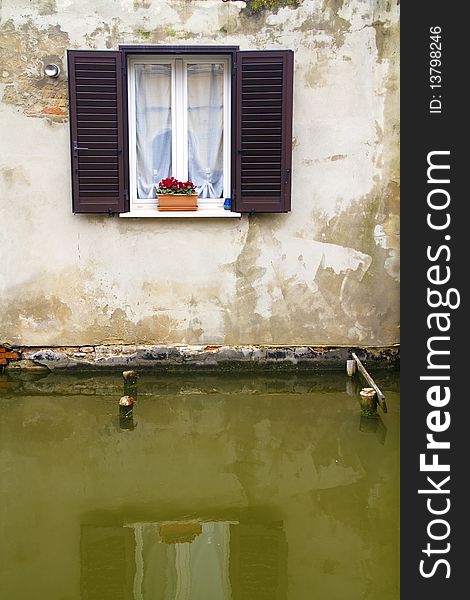 Window of an old house by the river