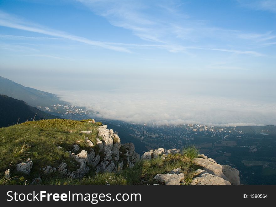 Yalta and tsunami like clouds. The Crimea mountains. Spring.