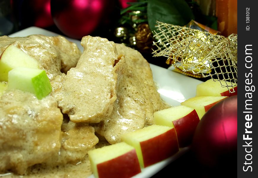 Chicken breast whit christmas decoration and bottle of wine. Chicken breast whit christmas decoration and bottle of wine