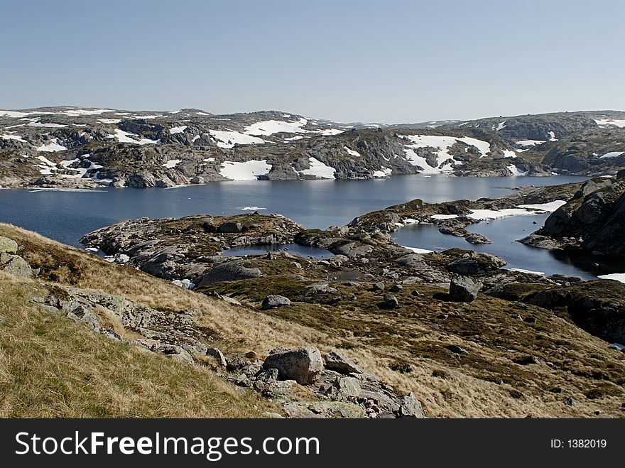 Picture of mountain lake and glaciers in central Norway. Picture of mountain lake and glaciers in central Norway.