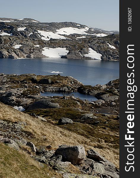 Picture of mountain lake and glaciers in central Norway. Picture of mountain lake and glaciers in central Norway.