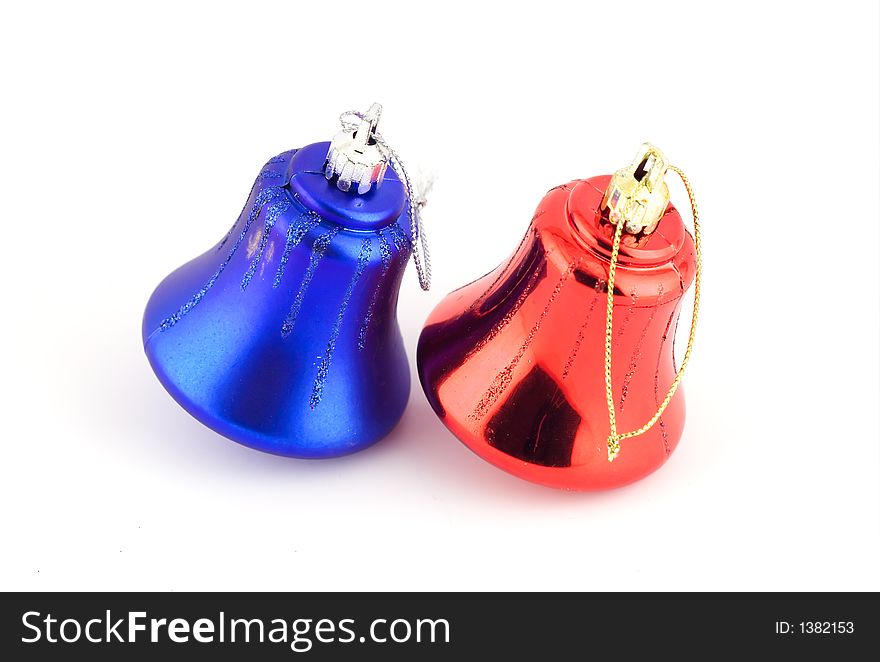 Isolated christmas decorations on white background (Red and blue bells)