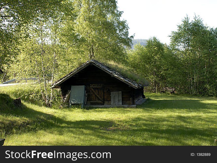 Picture of an old log house in Central Norway. Picture of an old log house in Central Norway.