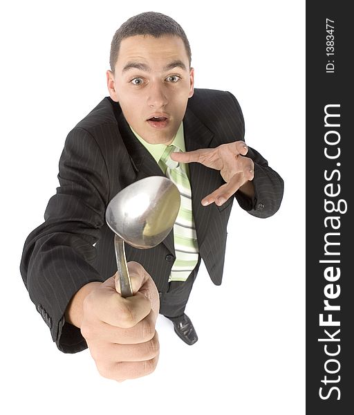 Businessman bending spoon by mind force