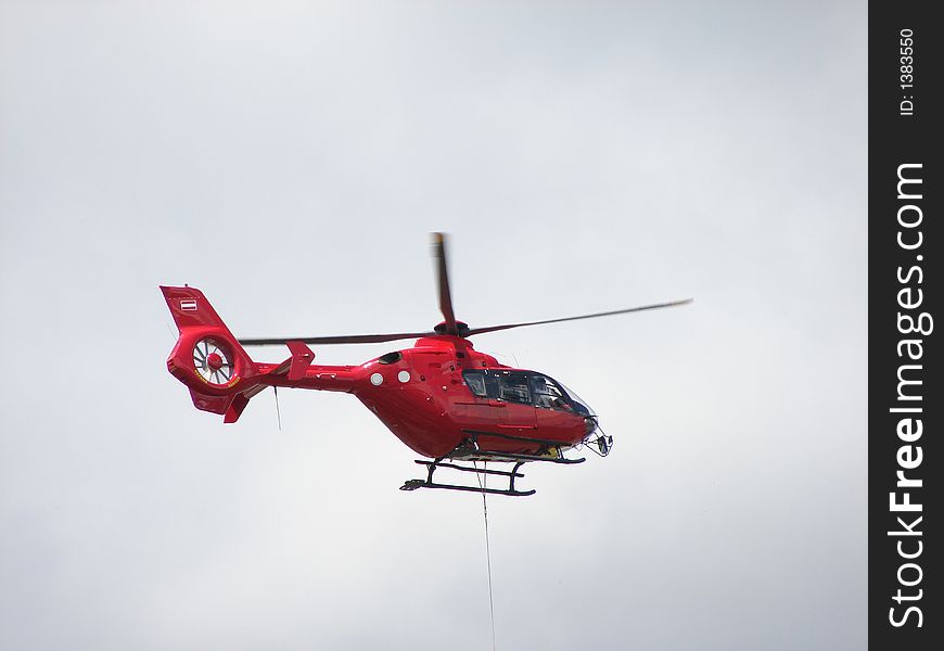 Mountain rescue helicopter in action