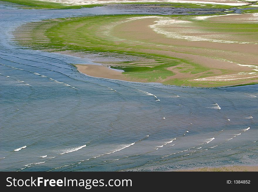 With Seaweed Covered Sand On The Beach Of Saint Michel-en-GrÃ¨ve (Bretagne)