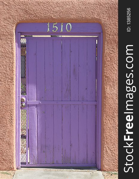 Purple door with stucco, southwest style door