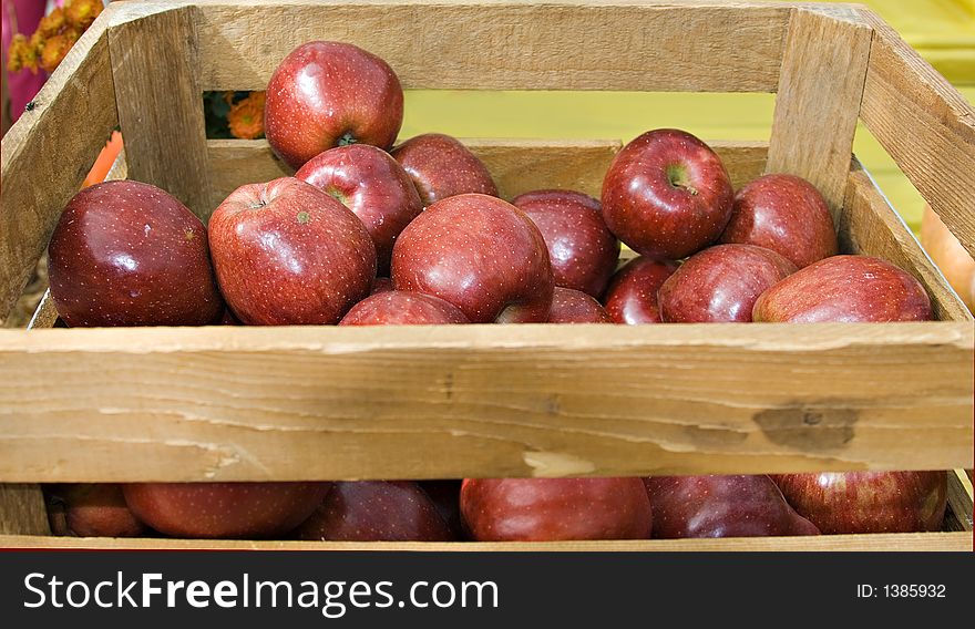 A crateful of apples at the market. A crateful of apples at the market.