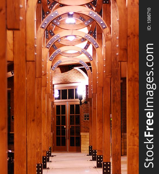 Wood pillars leading to a door