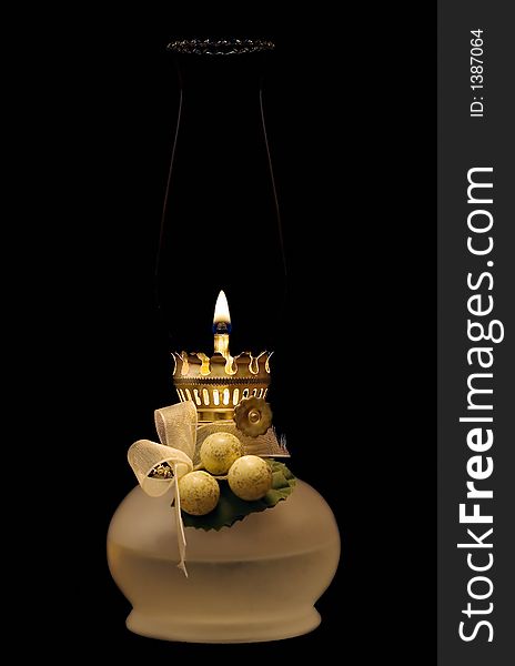 Oil lamp on a black background