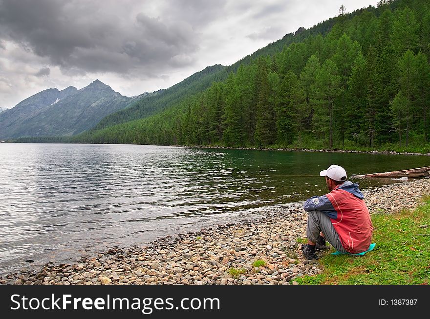 Landscape with man, lake and mountains, Altay. Russia. Landscape with man, lake and mountains, Altay. Russia.