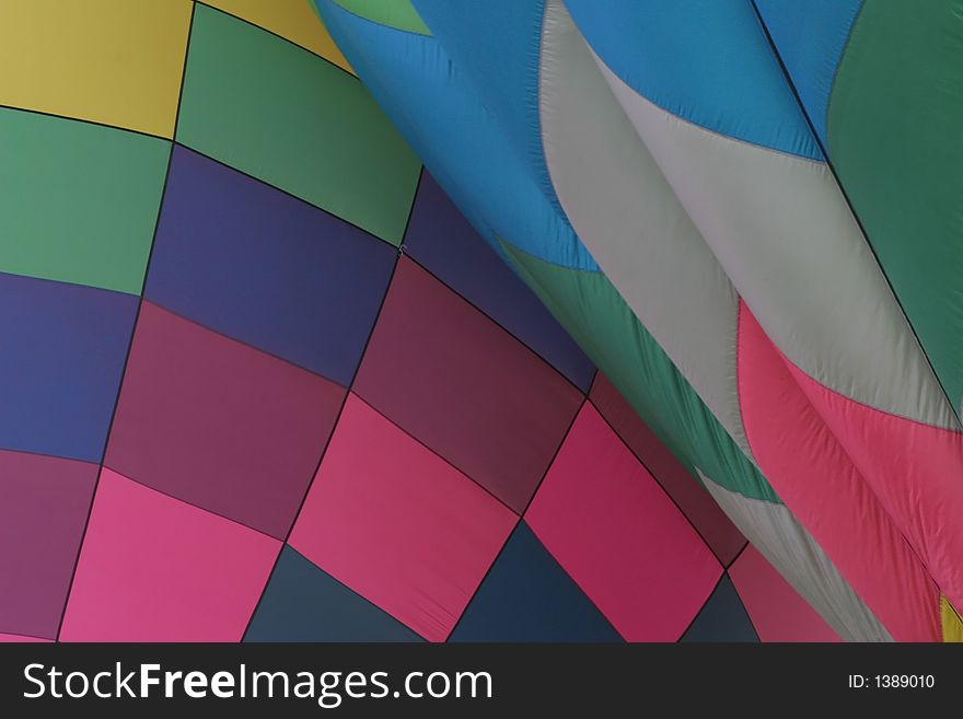 Two hot air balloons inflating