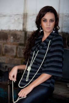 Fashion Shot In Auto Repair Shop. Royalty Free Stock Image