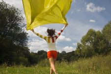 Woman In Sunny Day Runnig With Yellow Fabric Royalty Free Stock Images Woman In Sunny Day Runnig With Yellow Fabric Royalty Free Stock Images