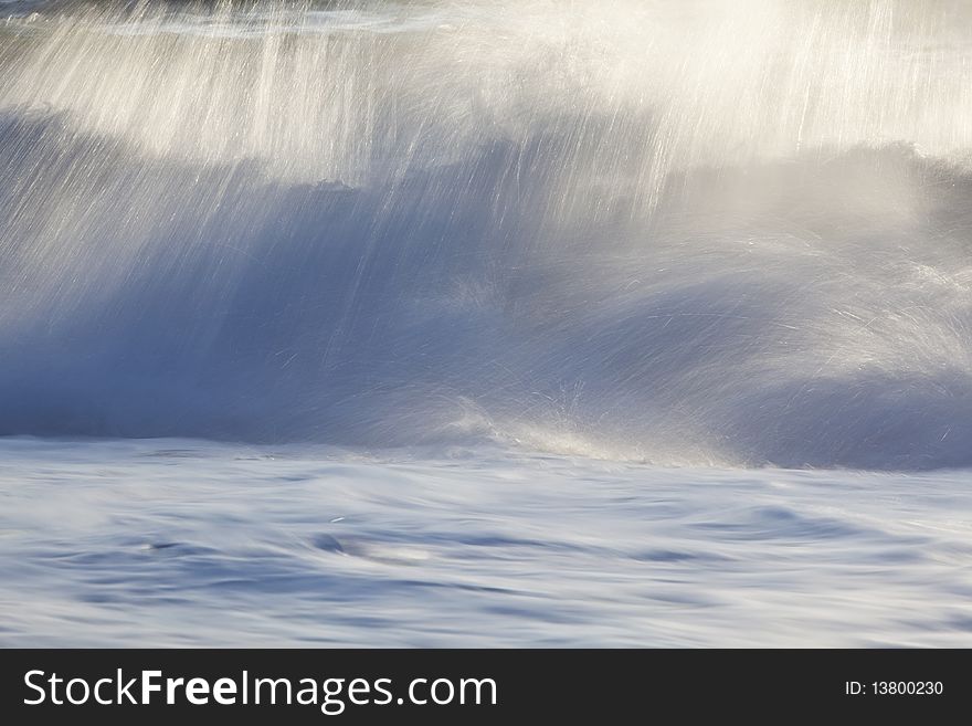 Dying waves at shore, long exposed action.