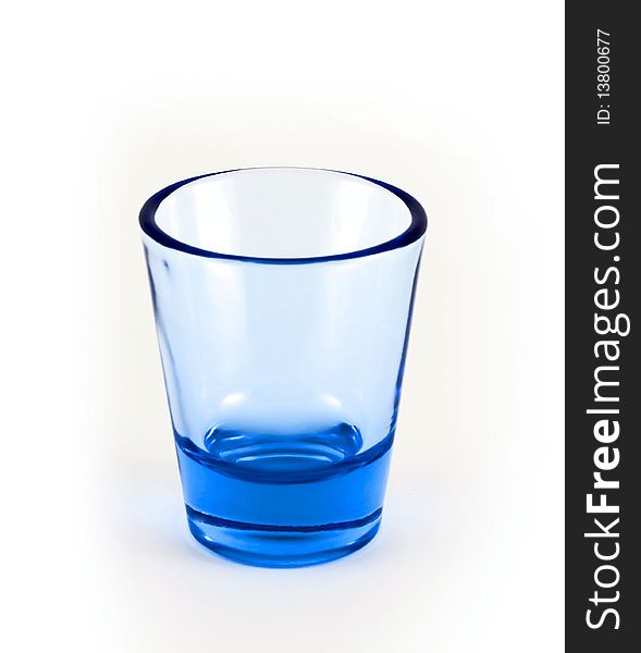 Empty blue glass on a white background