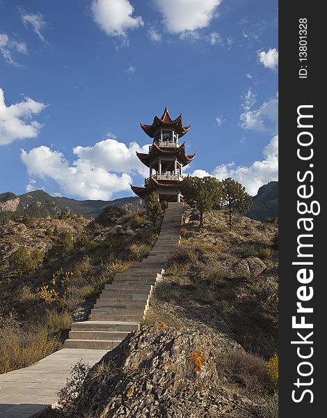 The Chinese style pavilion under blue sky. The Chinese style pavilion under blue sky