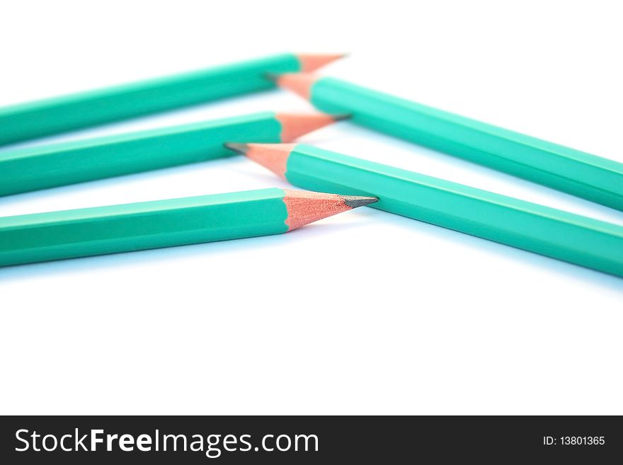 Five pencils isolated on white background.