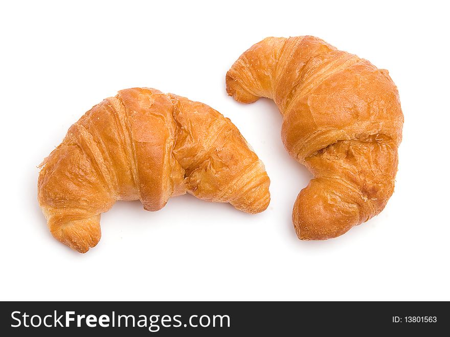 The image of two croissants isolated on white