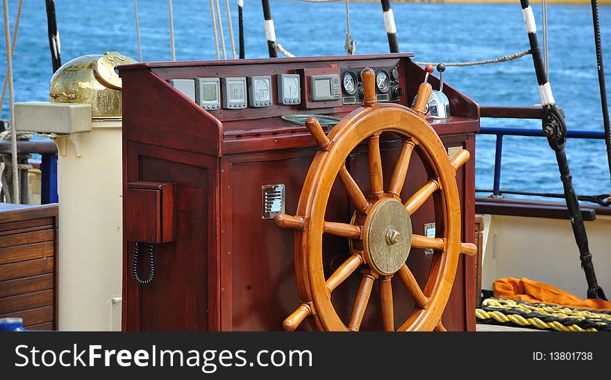 Rudder-wheel of an old wooden ship